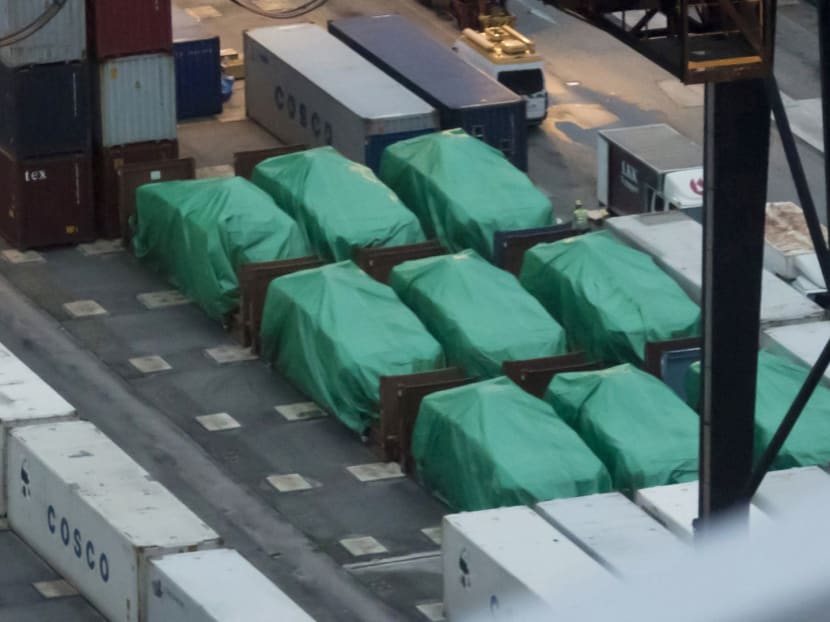 In this photo taken Thursday, Nov. 24, 2016, Nine eight-wheeled Singapore-made Terrex infantry carrier vehicles are detained at a container terminal in Hong Kong. Photo: AP