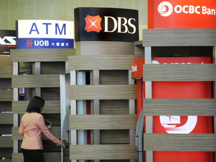 DBS, OCBC and UOB, the three largest local banks, have been communicating with affected customers and encouraging them to take up the Repayment Assistance Scheme (RAS), among other mitigation measures. Photo: Bloomberg