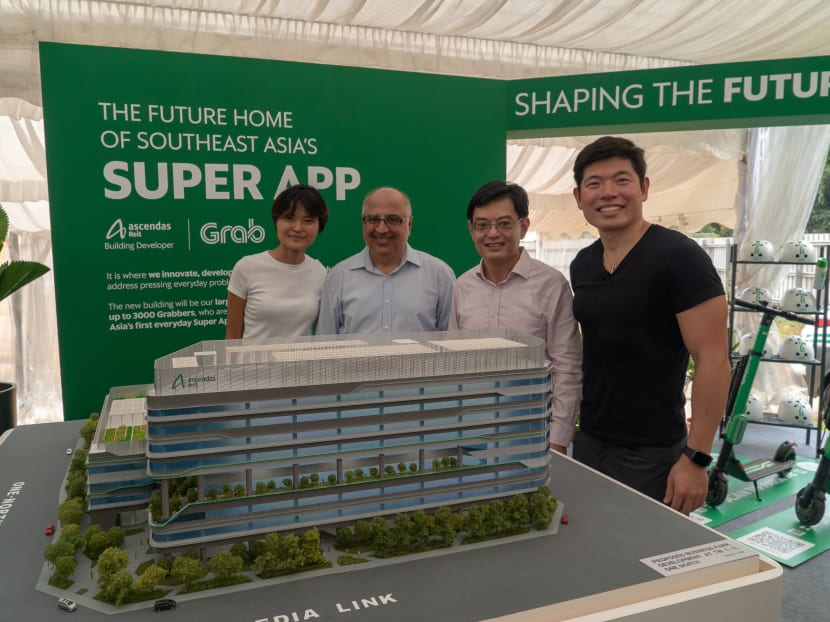 From left: Grab co-founder Tan Hooi Ling, Ascendas-Singbridge chief executive Manohar Khiatani, Finance Minister Heng Swee Keat and Grab chief executive officer Anthony Tan, with a 3D model of Grab’s new headquarters.