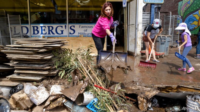 Biden warns of climate change 'code red' in visit to storm damage Biden warns of climate change 'code red' in visit to storm damage