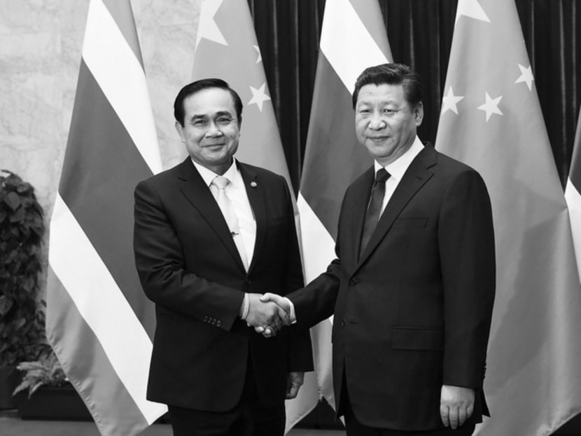 Thailand’s Prime Minister Prayuth Chan-ocha (left) with China’s President Xi Jinping in Beijing last December.  Photo: Reuters