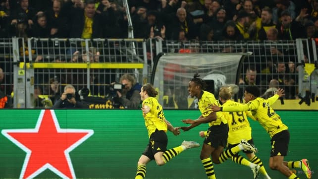 Dortmund down Atletico Madrid in thriller to make Champions League semi-finals