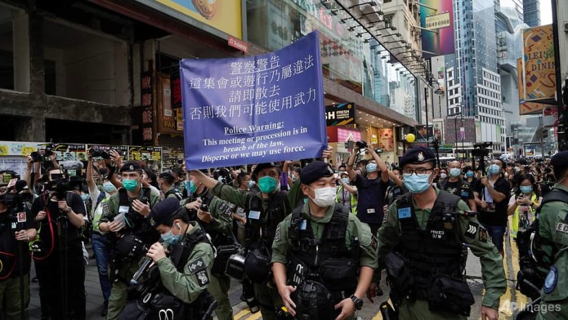 Hong Kong police patrol against protests on China holiday