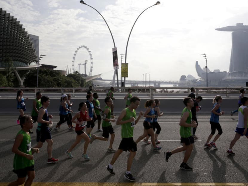 Organisers of the 2017 Standard Chartered Singapore Marathon have apologised to those affected by road closures during the race on Dec 3. TODAY file photo