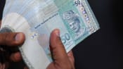 Adopt 'Malaysia First' attitude to strengthen ringgit, says country's finance ministry