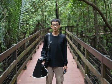 "Herper" Hamad Azam, 21, pictured with his photography equipment in Pasir Ris on May 28, 2024.