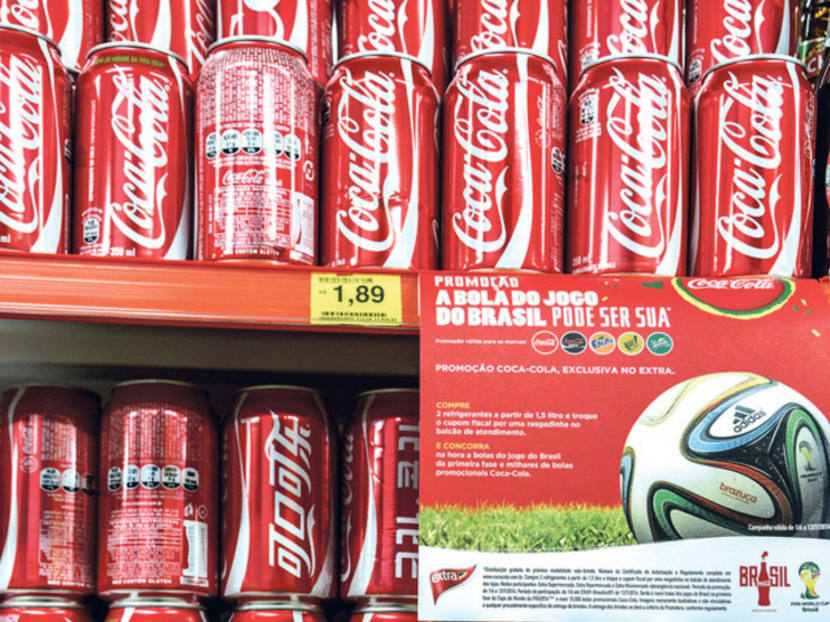 It is up to 
sponsors such as Coca-Cola to have the courage to withdraw from the bidding for commercial rights to the 2018 and 2022 World Cups. PHOTO: BLOOMBERG