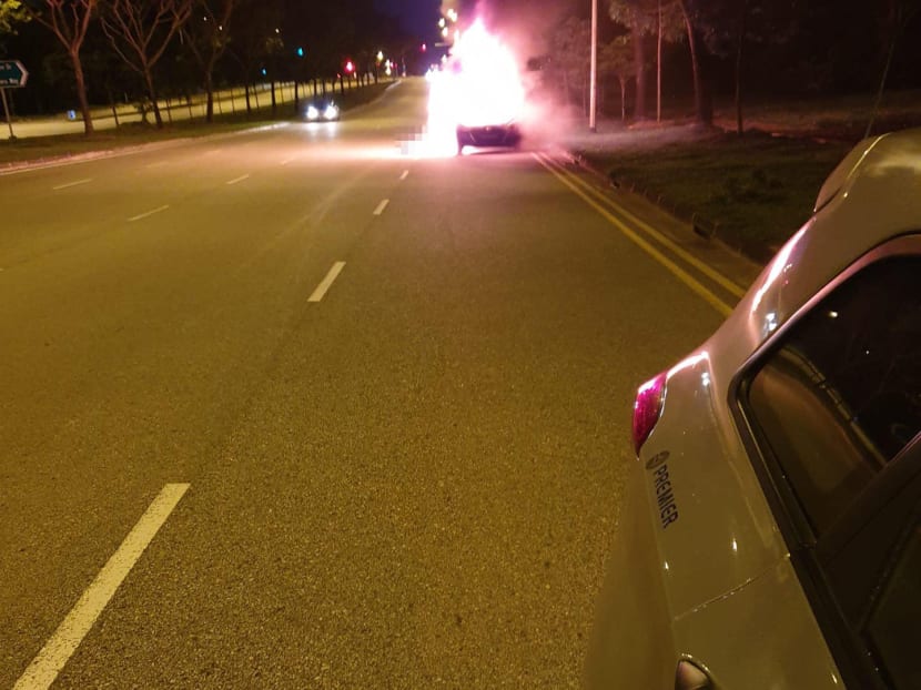 A photo allegedly of the incident shows flames engulfing a vehicle on the side of a road. A photo allegedly of the incident shows flames engulfing a vehicle on the side of a road.