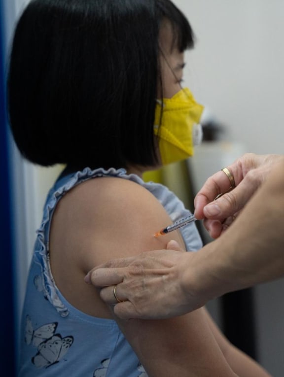 A child receiving the Covid-19 vaccine at Our Tampines Hub vaccination centre on Jan 12, 2022. A child receiving the Covid-19 vaccine at Our Tampines Hub vaccination centre on Jan 12, 2022.