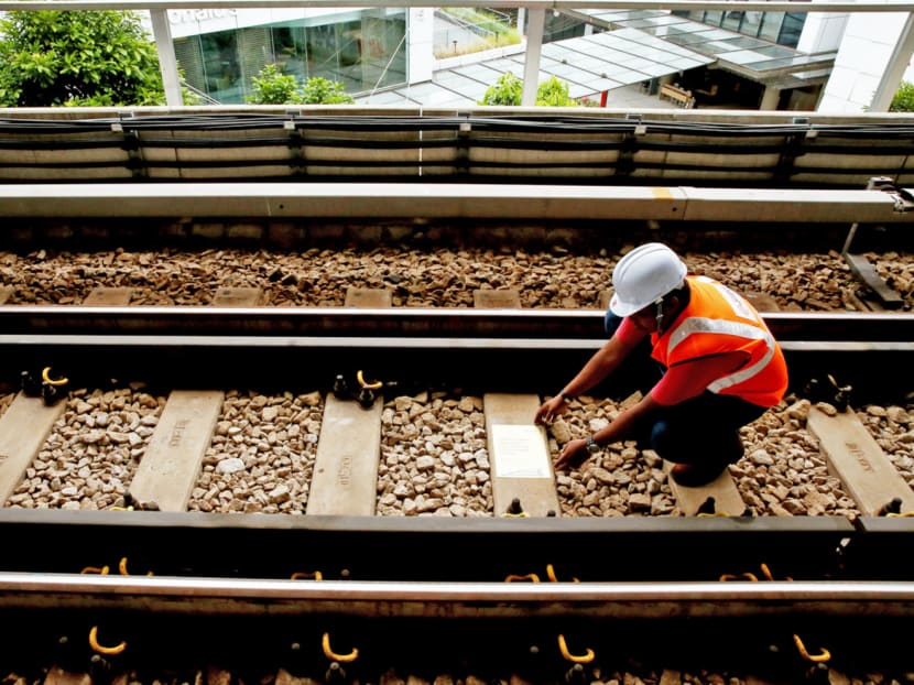 The sleeper replacement project on the North-South and East-West Lines, which began in August 2013 and ended last month, involved replacing 188,000 ageing wooden sleepers with concrete ones. PHOTO: KOH MUI FONG