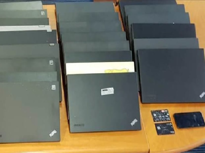 The police seized laptops, a mobile phone and two credit cards.