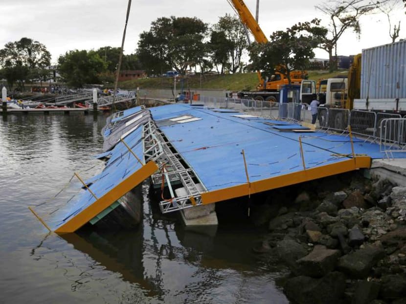 A ramp built for competitors' boats to reach the water hangs after collapsing at the Marina da Gloria sailing venue just days before the start of the Rio 2016 Olympic Games in Rio de Janeiro, Brazil, July 31, 2016. PHOTO: REUTERS