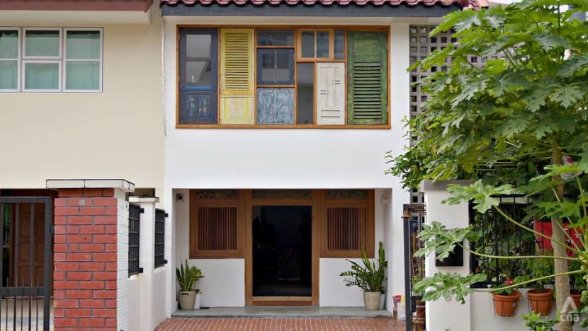 A terrace house in Singapore with upcycled Javanese windows and