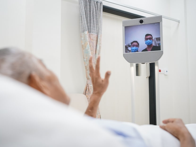 Alexandra Hospital says the robot, know as BeamPro, allows patients to be inspected remotely while being isolated. Alexandra Hospital says the robot, know as BeamPro, allows patients to be inspected remotely while being isolated.