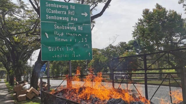 义顺道路指示牌被焚烧桶“融化” 陆交局报警
