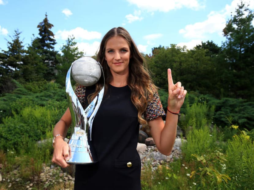 Karolina Pliskova of the Czech Republic poses with the WTA World Number One trophy on August 6, 2017 in Toronto, Canada. (Photo by Vaughn Ridley/Getty Images)