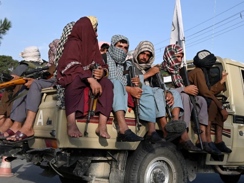 Taliban fighters in a vehicle patrol the streets of Kabul on Aug 23, 2021 as in the capital, the Taliban have enforced some sense of calm in a city long marred by violent crime, with their armed forces patrolling the streets and manning checkpoints.