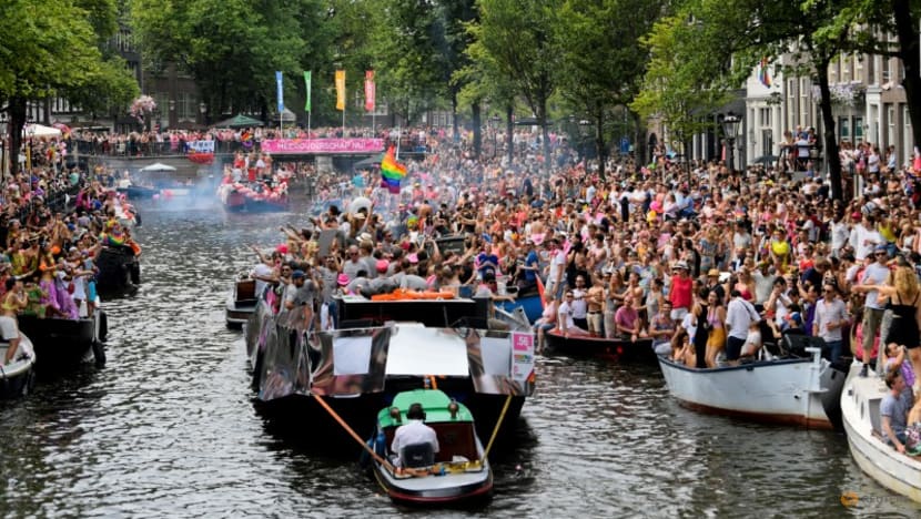 Amsterdam substitutes 'Pride Walk' for canal parade in 25th anniversary of Gay Pride Amsterdam substitutes 'Pride Walk' for canal parade in 25th anniversary of Gay Pride