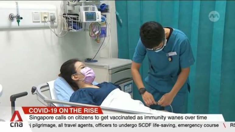 Singapore sees surge in COVID-19 cases, expects new wave to peak in a month