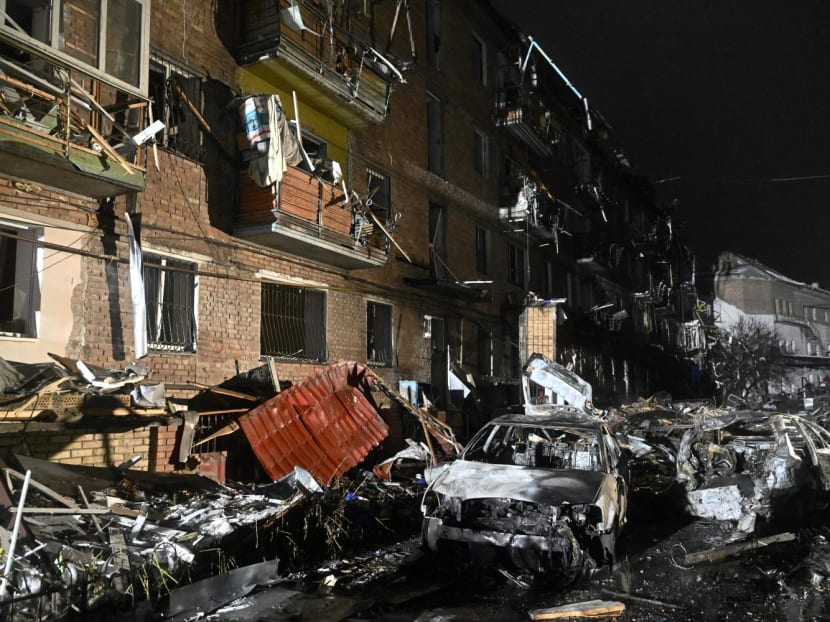 Burnt cars are seen in front of a damaged residential building, following a Russian strike in the town of Vyshgorod on the outskirts of Kyiv on Nov 23, 2022. Burnt cars are seen in front of a damaged residential building, following a Russian strike in the town of Vyshgorod on the outskirts of Kyiv on Nov 23, 2022.