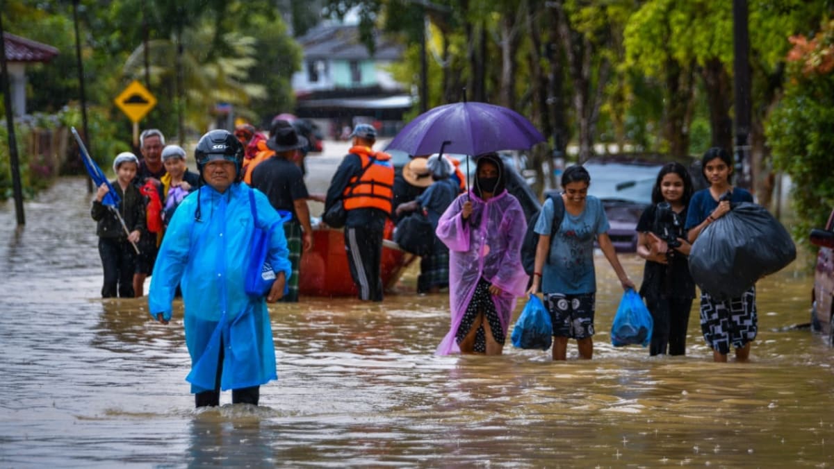 马来西亚洪水至少四人死亡，数万人撤离