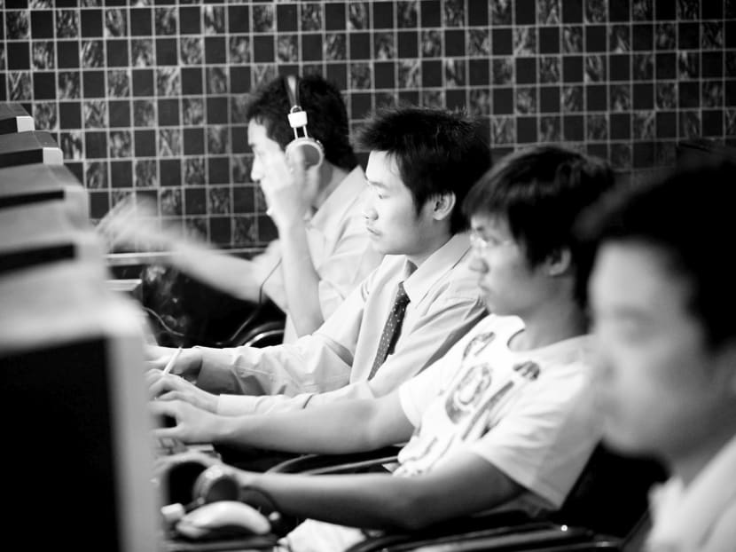 Customers at a Chinese Internet cafe in Beijing. Multilingual domain names will enable many non-English speaking communities to come online, which is extremely relevant to the Asia-Pacific. Photo: Bloomberg