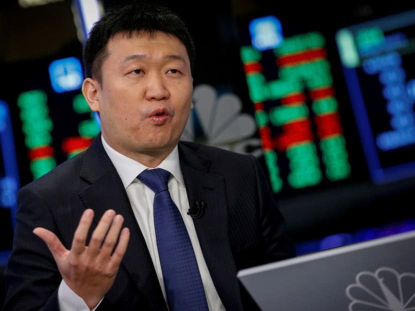 Forrest Li (pictured), 44, a naturalised Singapore citizen who was from China, is regarded by some people as being shy to the point of secretive. Forrest Li (pictured), 44, a naturalised Singapore citizen who was from China, is regarded by some people as being shy to the point of secretive.