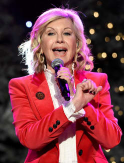 Olivia Newton-John performs before the 85th annual Hollywood Christmas Parade on November 27, 2016.
