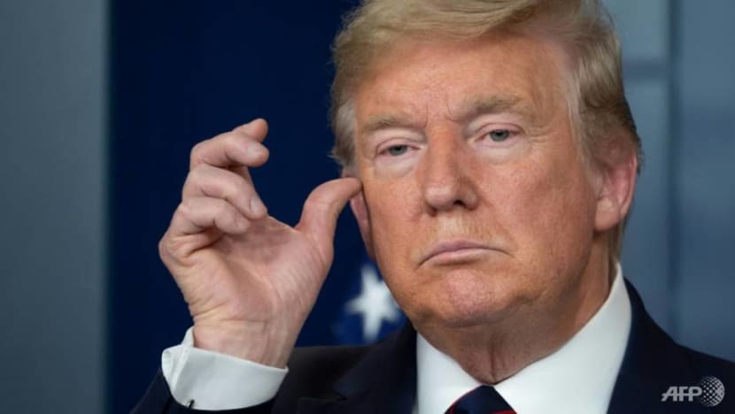 Commentary: Trump fights a two-front war on the coronavirus Commentary: Trump fights a two-front war on the coronavirus