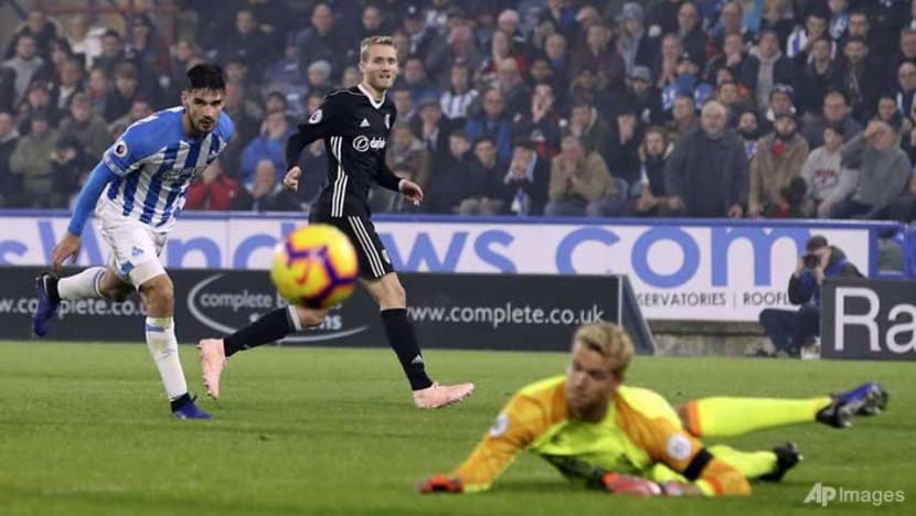 Football: Huddersfield off bottom of Premier League after beating Fulham Football: Huddersfield off bottom of Premier League after beating Fulham