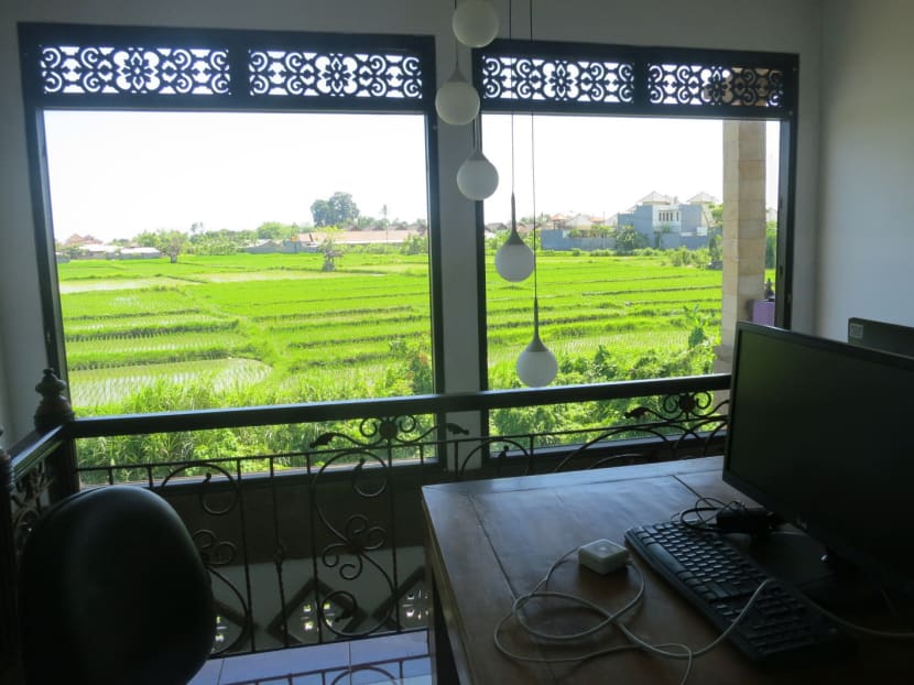 A co-working space at Livit Spaces in Gianyar Bali overlooks the rice fields. Photo: Laura Philomin