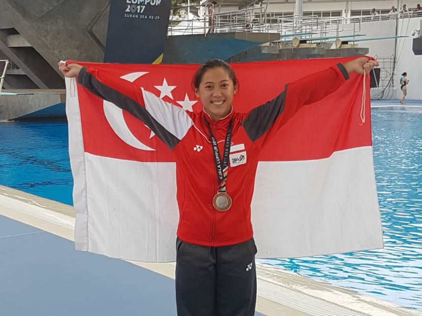 Freida Lim with her medal at the SEA Games. Photo: Singapore Swimming Association
