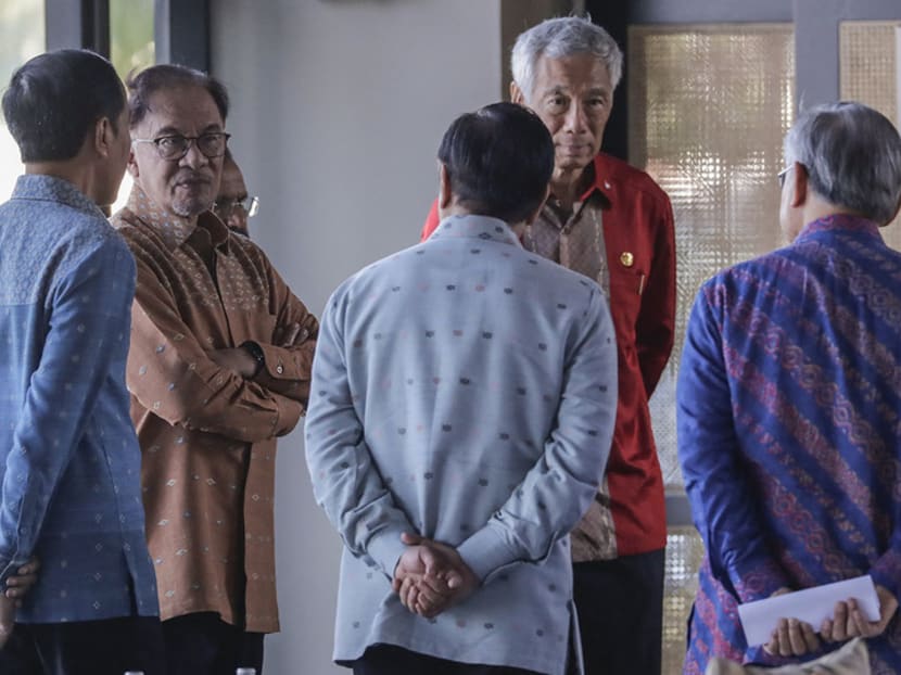 (L-R) Indonesia’s President Joko Widodo, Malaysia’s Prime Minister Anwar Ibrahim, Timor Leste's Prime Minister Taur Matan Ruak, Philippine President Ferdinand Marcos, Singapore’s Prime Minister Lee Hsien Loong and Thailand’s Deputy Prime Minister and Foreign Minister Don Pramudwinai gather prior to a retreat session at the Asean summit in Labuan Bajo on May 11, 2023.