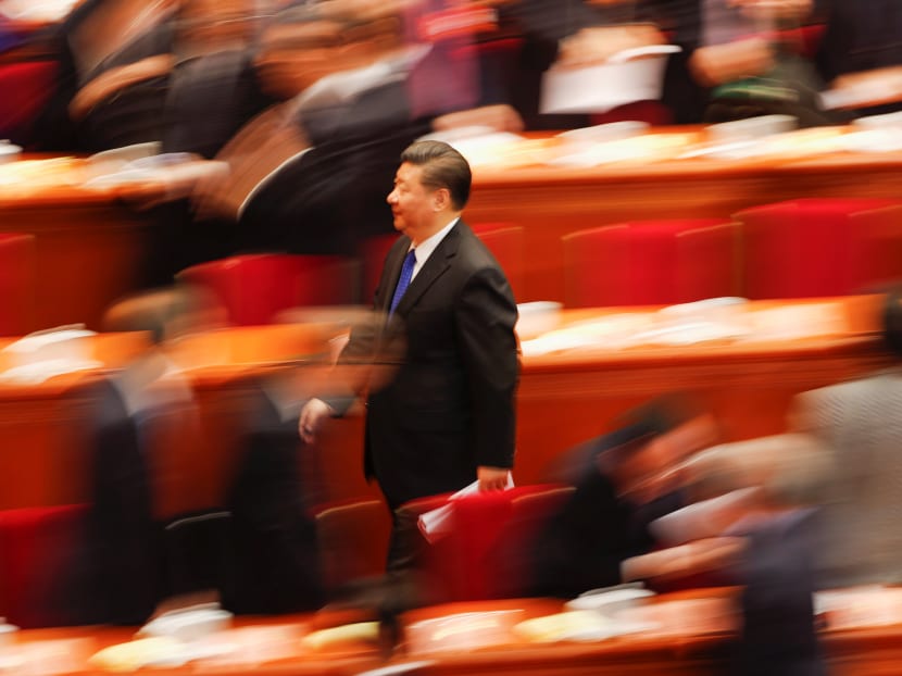 Chinese President Xi Jinping leaves the National People's Congress. Former leader Deng Xiaoping and Mr Xi are two disruptive leaders from two markedly different eras but what unites them is a belief that it takes bold action to shock the system into change.  Photo: Reuters