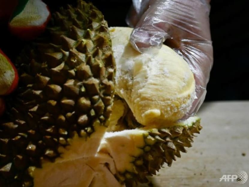 Commentary: Durians, blockchain and politics - inside the choppy world of Chinese investors in Malaysia