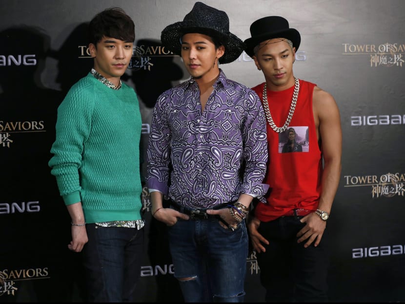 Seungri (left) with Big Bang band mates G-Dragon and Taeyang. Photo: Reuters