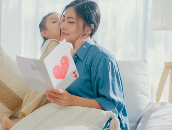 mother and daughter greeting card istock