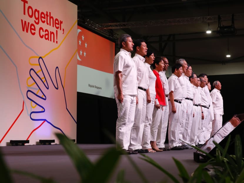 The PAP’s newly elected Central Executive Committee standing on the stage during the 2018 PAP Conference and Awards Ceremony at Singapore Expo, Hall 8 on Nov 11, 2018.