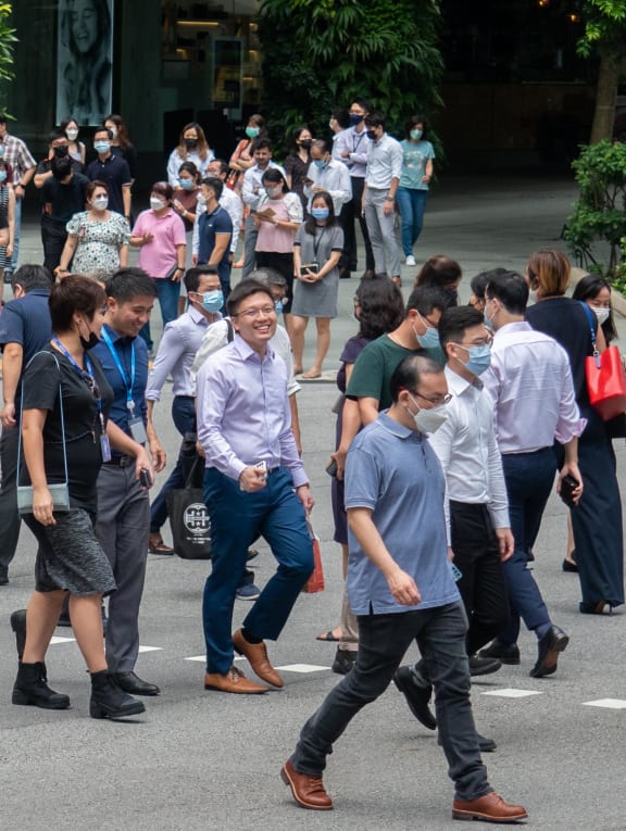 Crowds in the Central Business District on April 26, 2022, when all workers were allowed to return to the workplace. Crowds in the Central Business District on April 26, 2022, when all workers were allowed to return to the workplace.