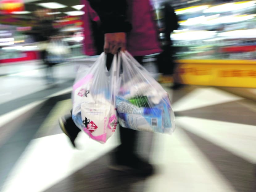 Retailers, such as pharmacies and those selling dry goods, could start asking customers if they need a plastic bag. Photo: Reuters