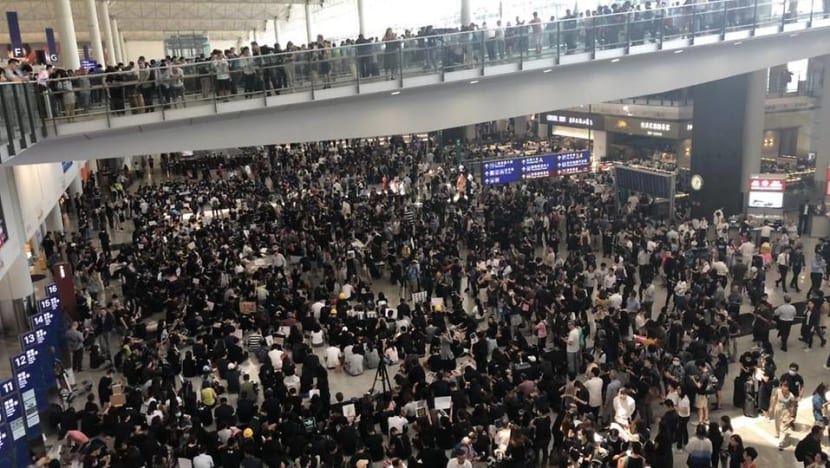 Protesters rally at Hong Kong airport over controversial extradition Bill