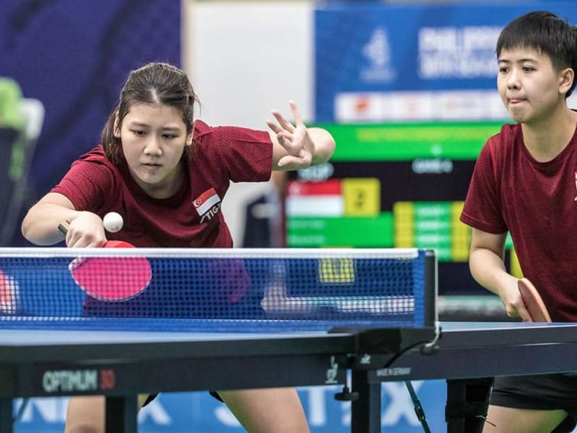 Singapore’s Wong Xin Ru (left) and Goi Rui Xuan in action at the SEA Games.