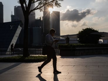 The "urban heat island effect" is contributing to warmer temperatures in Singapore, as the man-made environment drives up the mercury more than greener areas, a report found. 