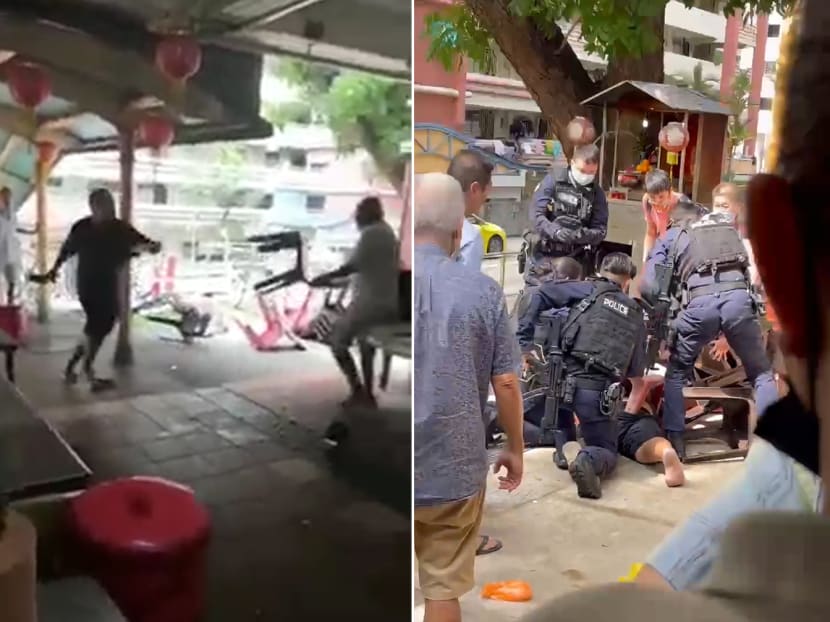 In a video posted on the Tiagongsg Facebook page, a man in a dark-coloured T-shirt is seen charging at another man with what appears to be a knife. He was pinned down later by onlookers and arrested by the police. In a video posted on the Tiagongsg Facebook page, a man in a dark-coloured T-shirt is seen charging at another man with what appears to be a knife. He was pinned down later by onlookers and arrested by the police.