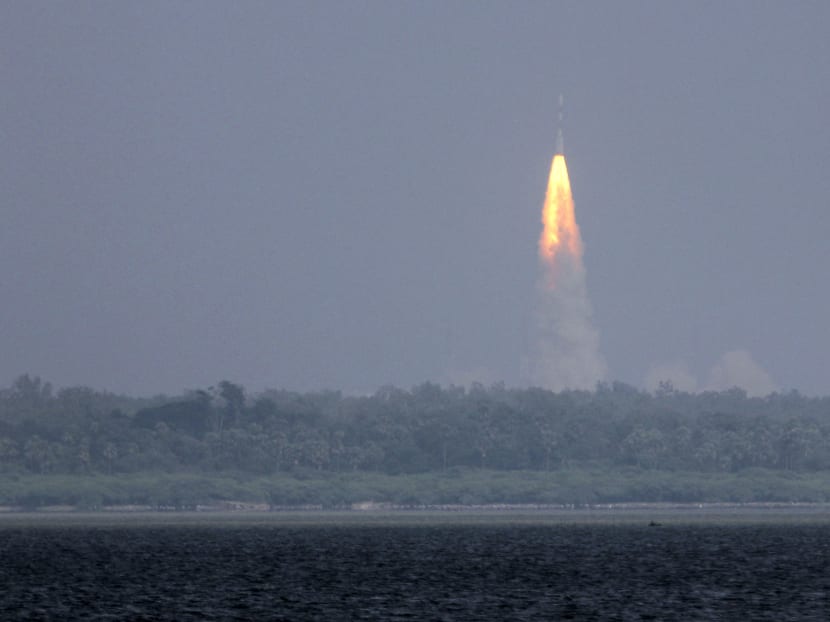 The Polar Satellite Launch Vehicle (PSLV-C25) rocket lifts off carrying India's Mars spacecraft from the east-coast island of Sriharikota, India, Nov 5, 2013. Photo: AP