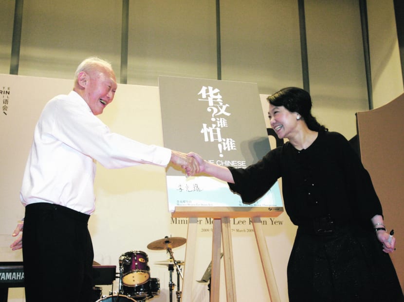 Mr Lee sharing a light moment with Ms Lim Sau Hoong, an award-winning Singaporean designer and businesswoman, at the launch of the 30th anniversary of the Speak Mandarin Campaign at the NTUC Auditorium in 2009. Ms Lim was cited by Mr Lee as someone whose effective bilingualism allowed her to make a contribution to director Zhang Yi-mou’s opening ceremony at the 2008 Beijing Olympics. TODAY FILE PHOTO