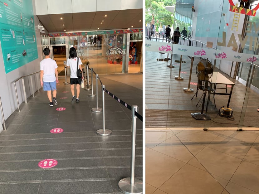 The writer says he took this photo at about 8.25am on Dec 3, 2020 at a Bedok Mall entrance, where there was no personnel to ensure that visitors use SafeEntry check-ins and have their temperatures taken, with people walking through without doing so.
