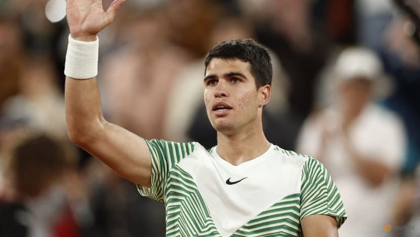 Top seed Alcaraz hunts down Tsitsipas to set up Djokovic showdown
