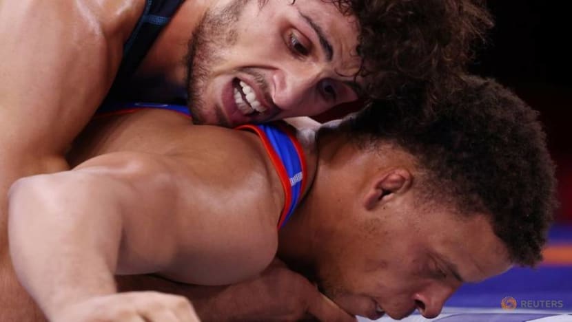 Olympics-Wrestling-Greco-Roman champ Borrero falls to Zoidze in day of upsets Olympics-Wrestling-Greco-Roman champ Borrero falls to Zoidze in day of upsets