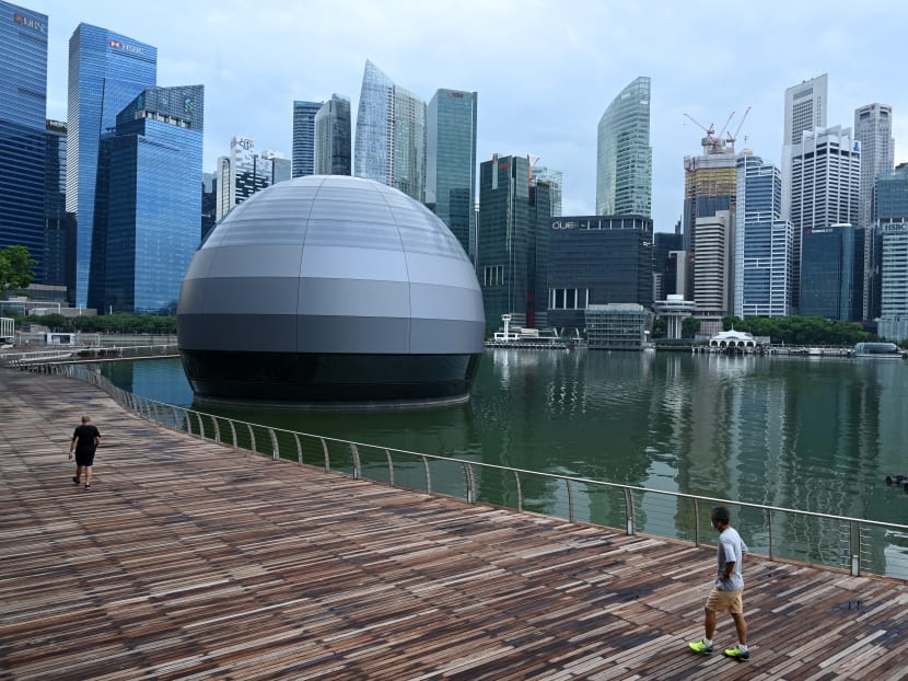 A view of Singapore's financial district in the background from Marina Bay. Finance Minister Heng Swee Keat said that Singapore must remain attractive to those who work hard and those who invest to create good jobs.